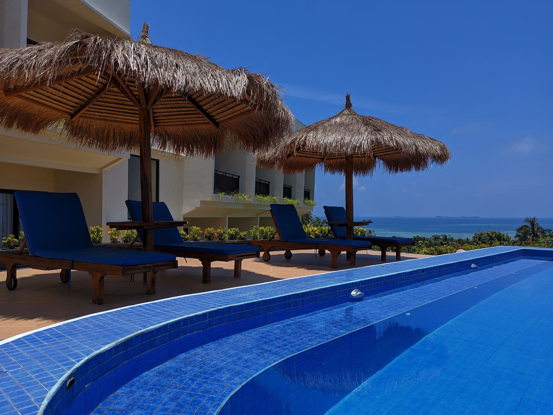 The Happinezz Hills hotel infinity pool overlooking Karimunjawa